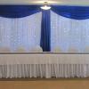 $115.00 ~ Double Backdrop 
Background  is White Voile
Valance is Royal Satin
with Lighted Curtain
from Always Invited Event Rentals