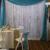 $59.00 ~ Single Backdrop
Background white voile
Valance turquoise crinkle 
and lighted curtain 
from Always Invited Event Rentals
