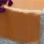 Peach Satin Runner from Always Invited Event Rentals